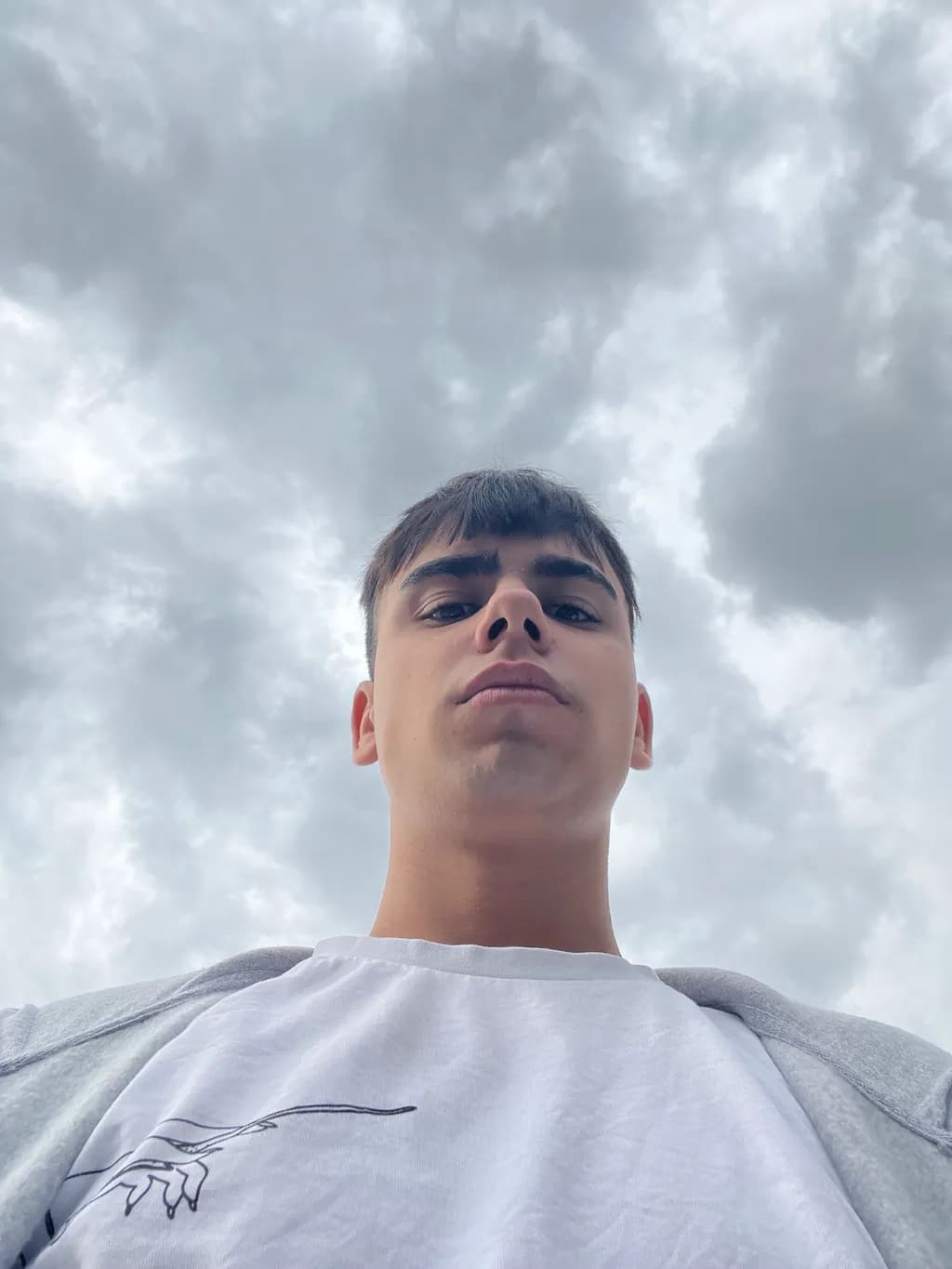 Cloudy Reflections: A Portrait of Contemplation and Connection