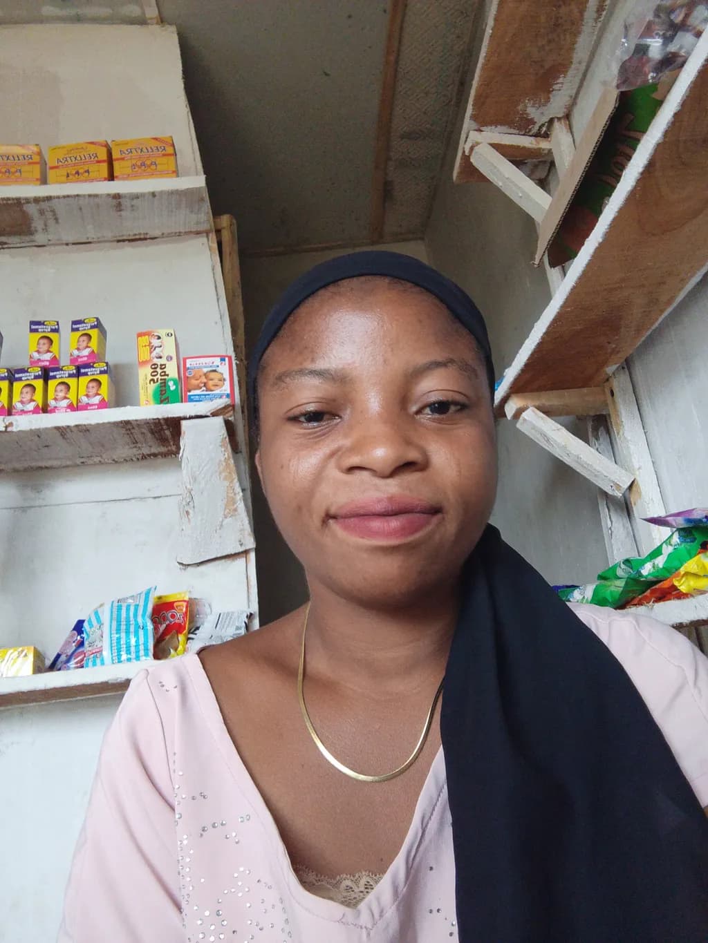 Radiant Smile: A Portrait of Everyday Joy in a Vibrant Store Setting