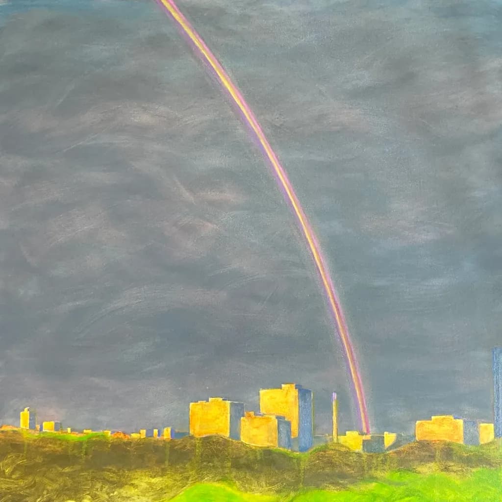 Whispers of Color: A Rainbow's Embrace Over Urban Horizons