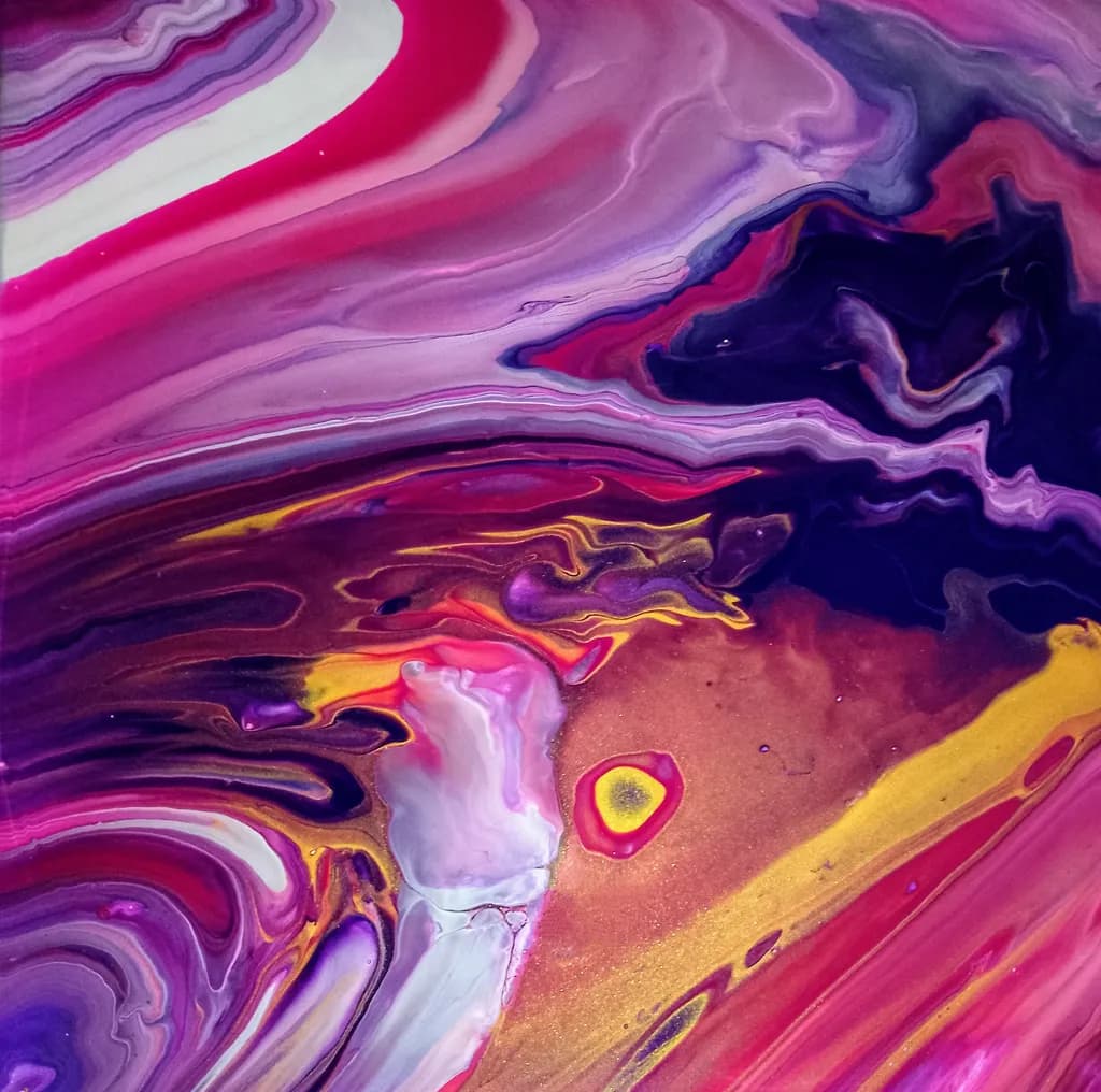 Vibrant Cosmic Dance: A Swirl of Pink, Purple, and Gold Elegance
