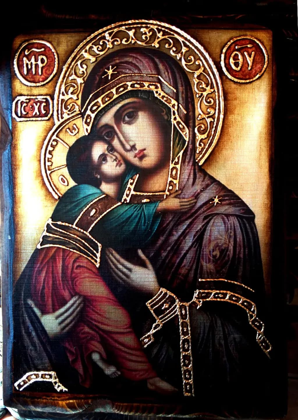 Divine Embrace: A Golden Icon of Mother and Child