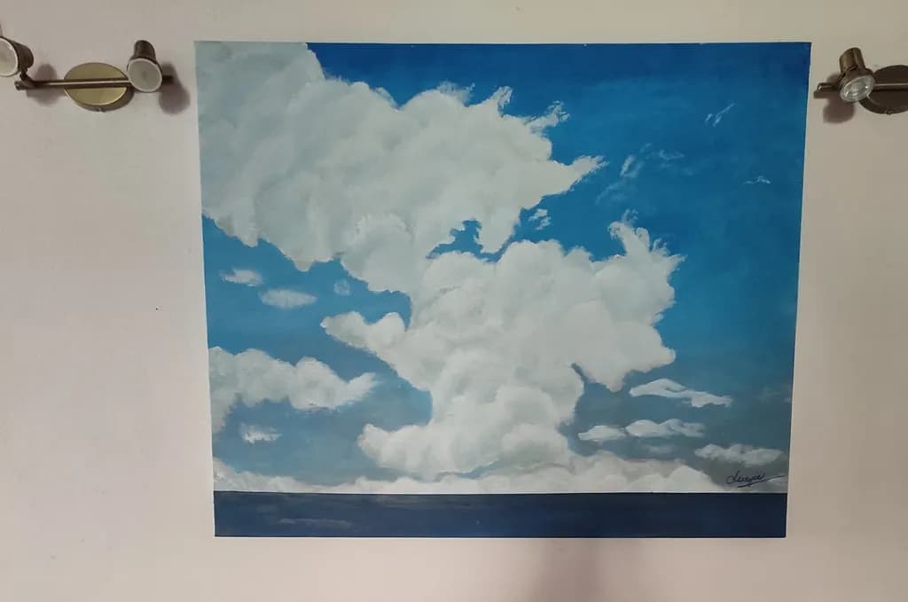Serenity in the Sky: A Tranquil Blue Cloudscape Painting