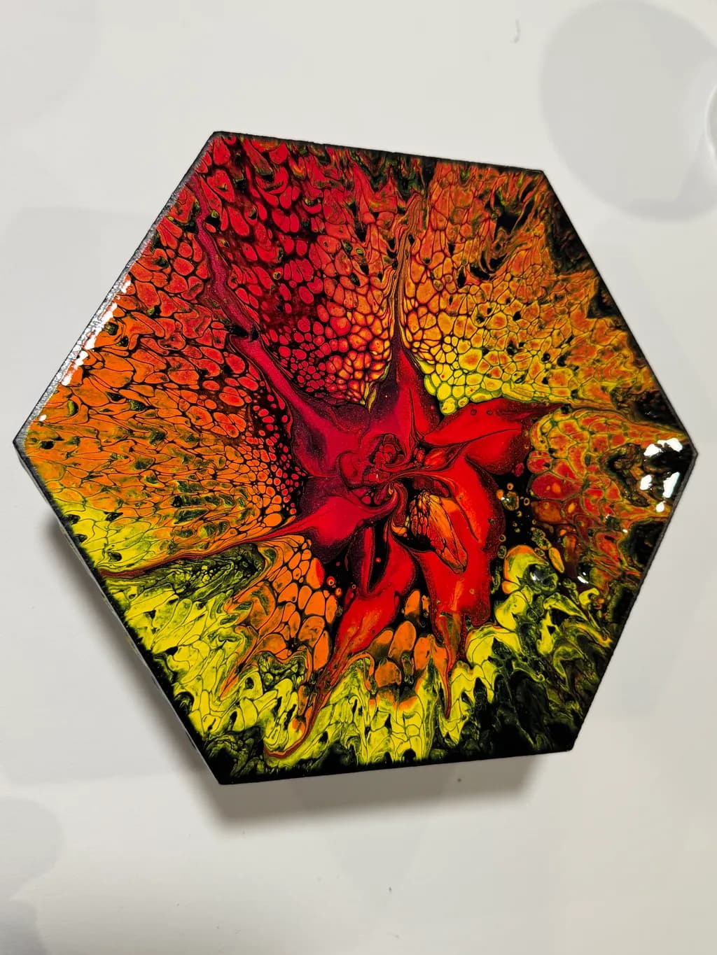 Vibrant Flame: A Hexagonal Dance of Red and Gold in Abstract Artistry