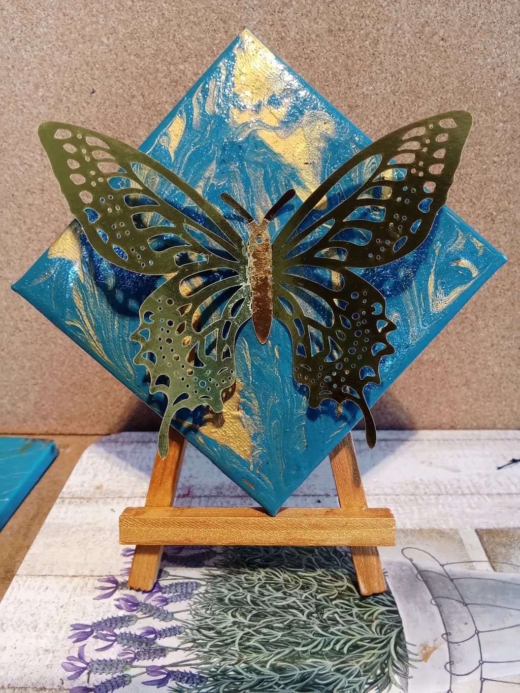 Golden Butterfly on Blue Canvas