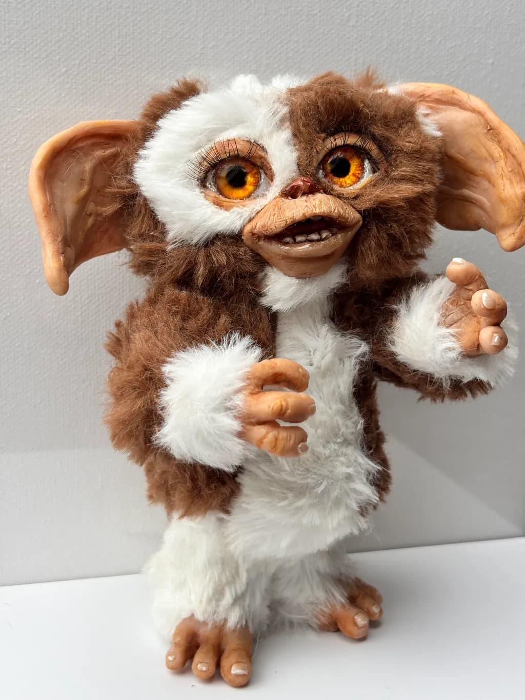 Whimsical Gremlin: A Charming Handcrafted Creature with Enchanting Eyes and Fluffy Fur