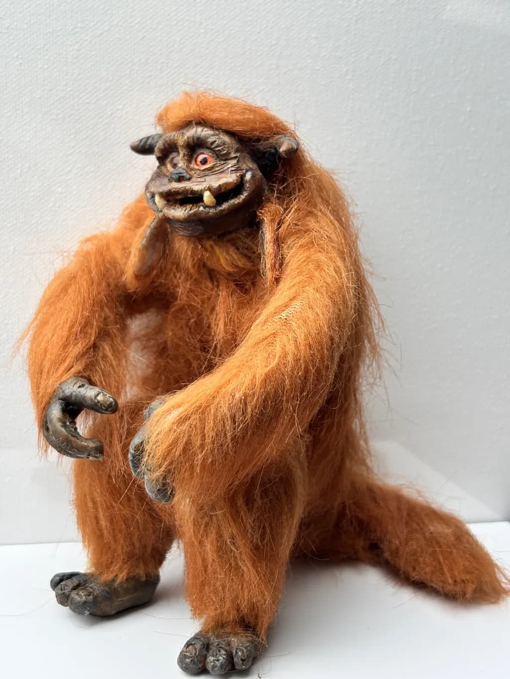 Whimsical Orange Creature: A Playful Furry Figure of Imagination