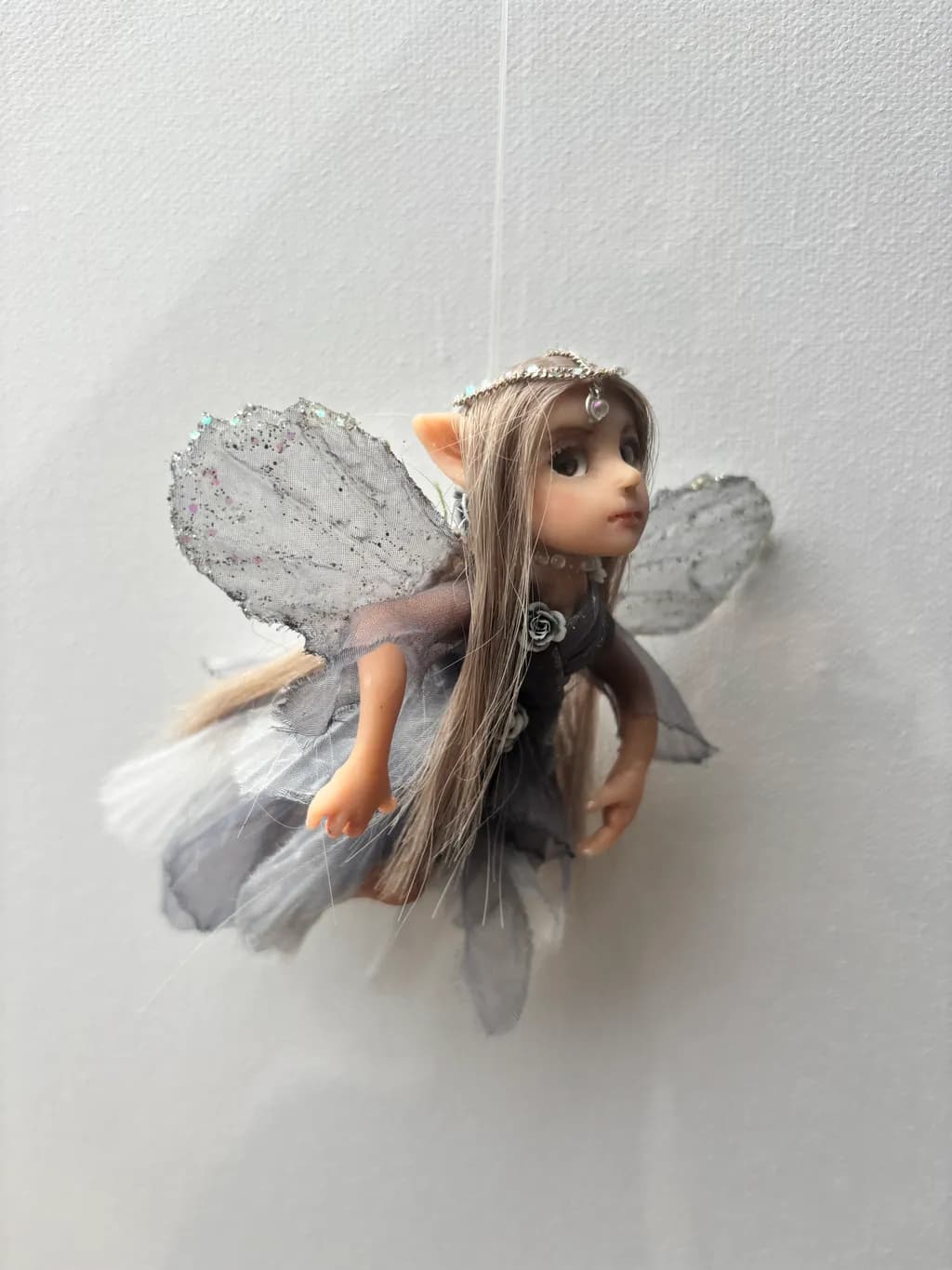 Whimsical Fairy Doll: A Delicate Fantasy in Costume and Charm