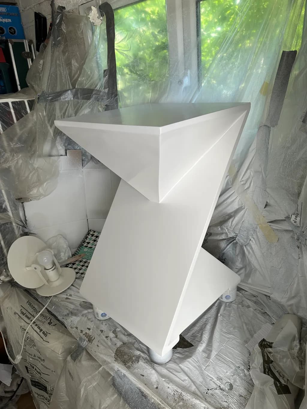 Sculptural Elegance: A Modern White Geometric Side Table for Contemporary Spaces