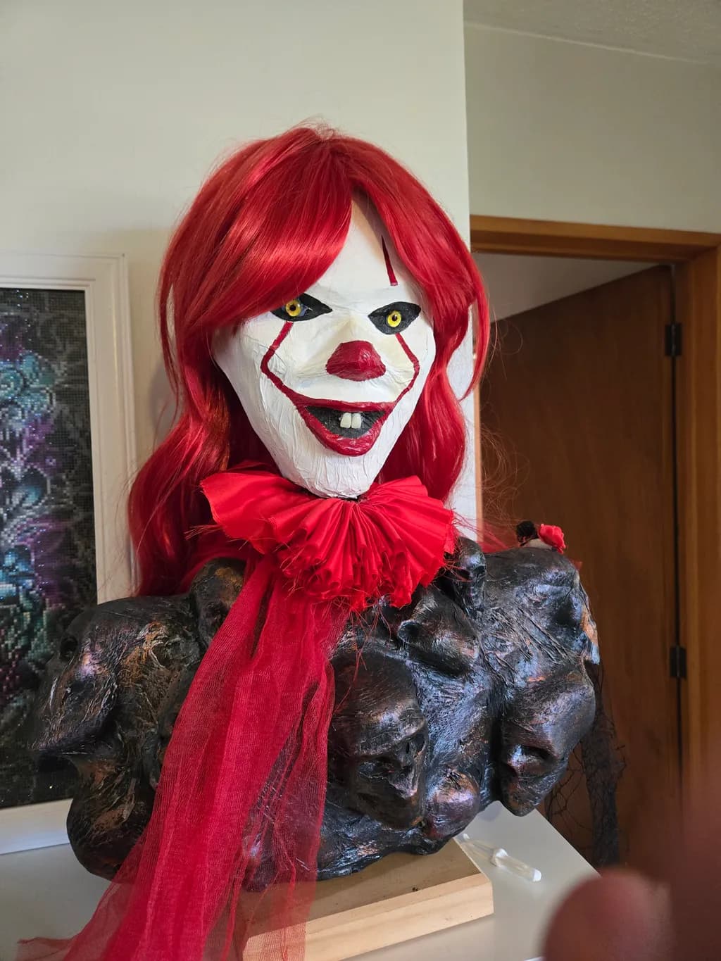 Creepy Clown Mask: Haunting Red Elegance with a Sinister Smile