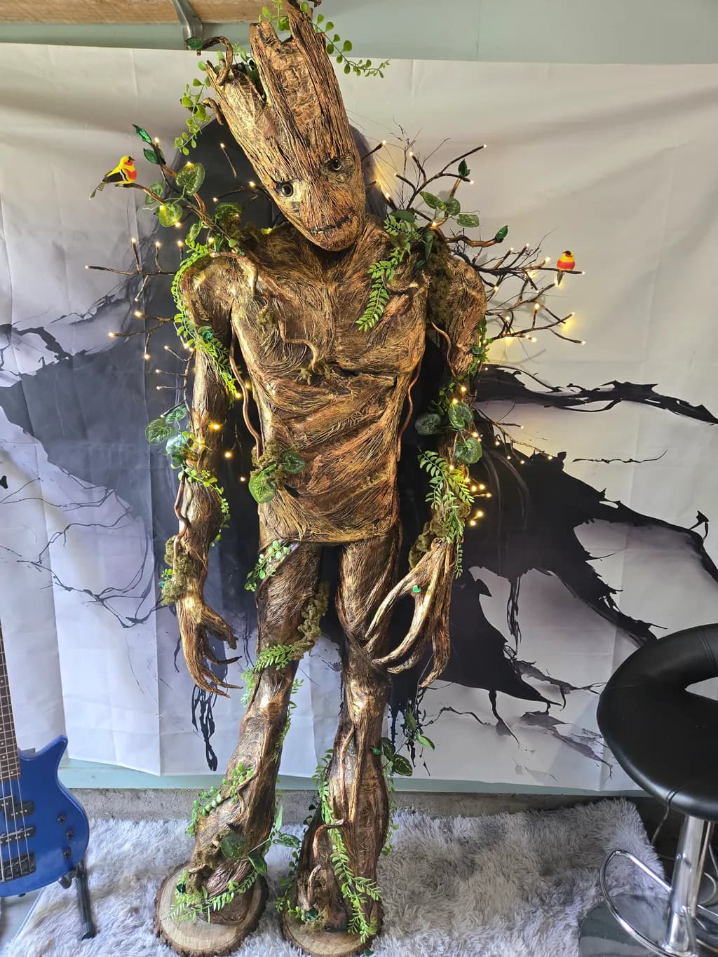 Whimsical Guardian of the Forest: A Fantasy Wooden Sculpture Adorned with Nature's Touch