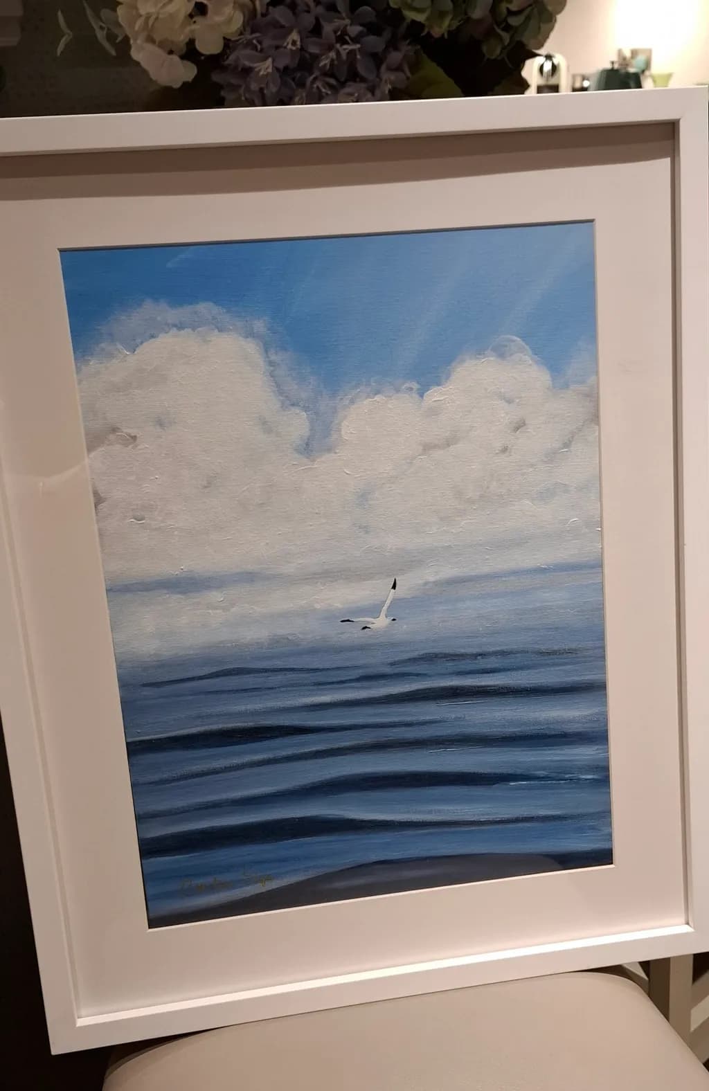 Serenity Above the Waves: A Tranquil Blue Sky and Ocean Escape