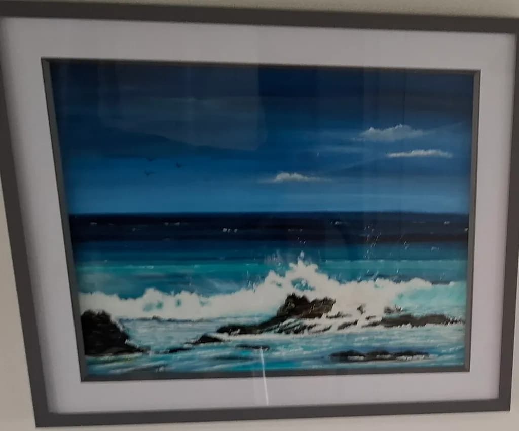 Ocean's Embrace: A Serene Dance of Waves and Rocks