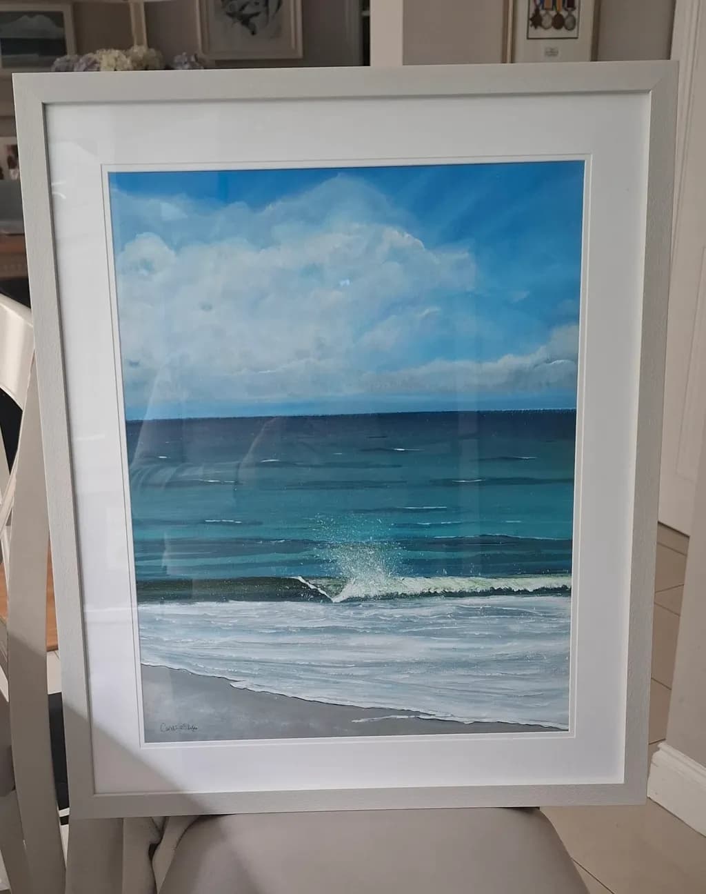 Serenity in Blue: A Coastal Wave Painting Capturing Ocean Tranquility