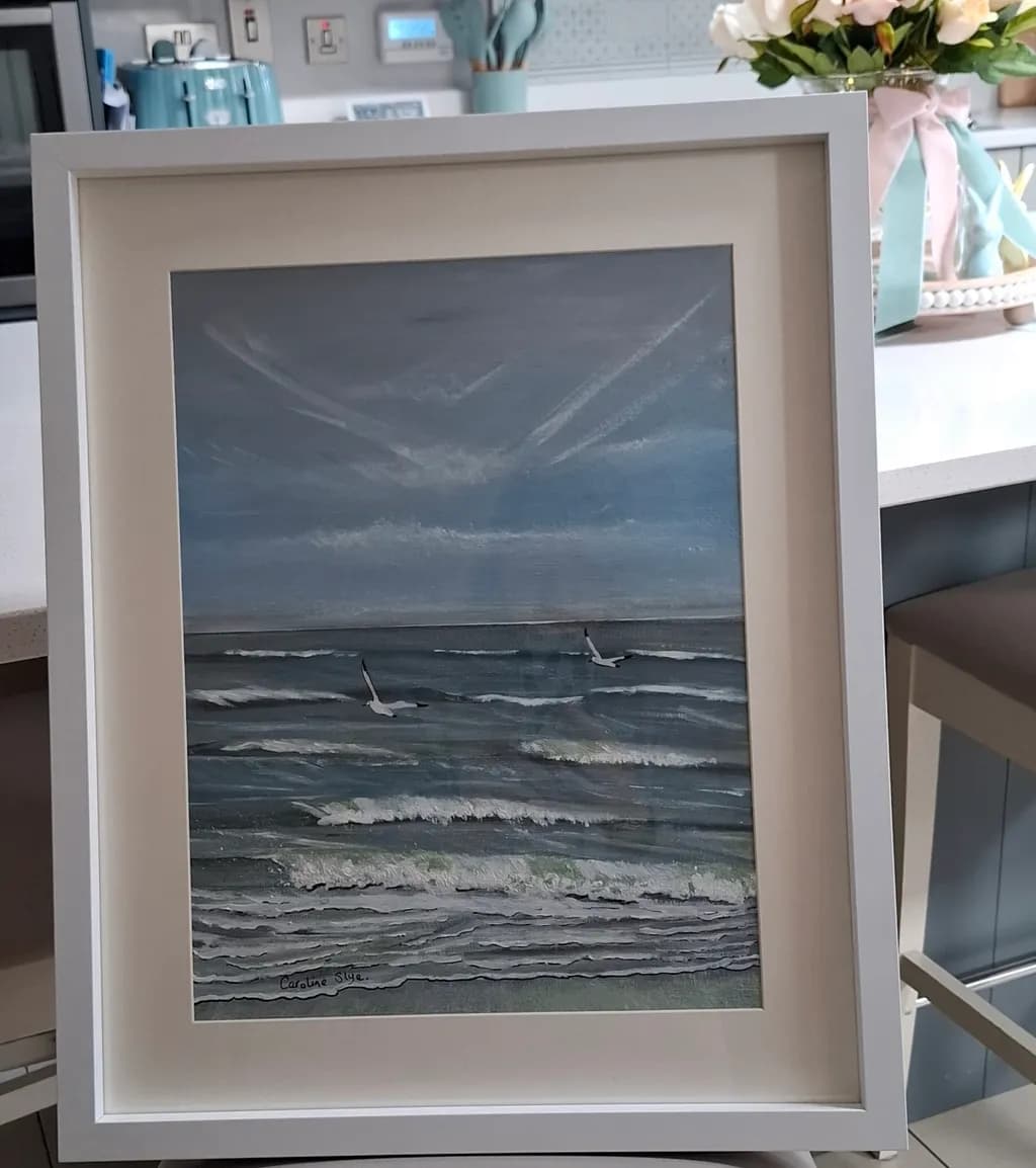 Serenity in Motion: A Coastal Dance of Waves and Sky