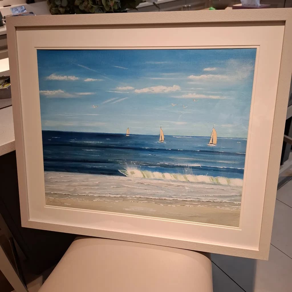 Sailing Serenity: A Tranquil Seascape with Gentle Waves and Soft Breezes