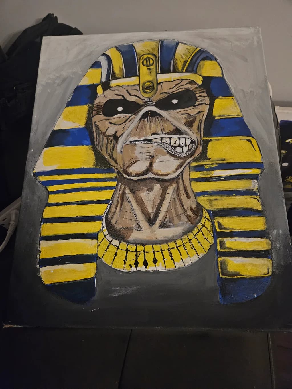 Pharaoh's Grin: A Creepy Metal Icon in Bold Colors