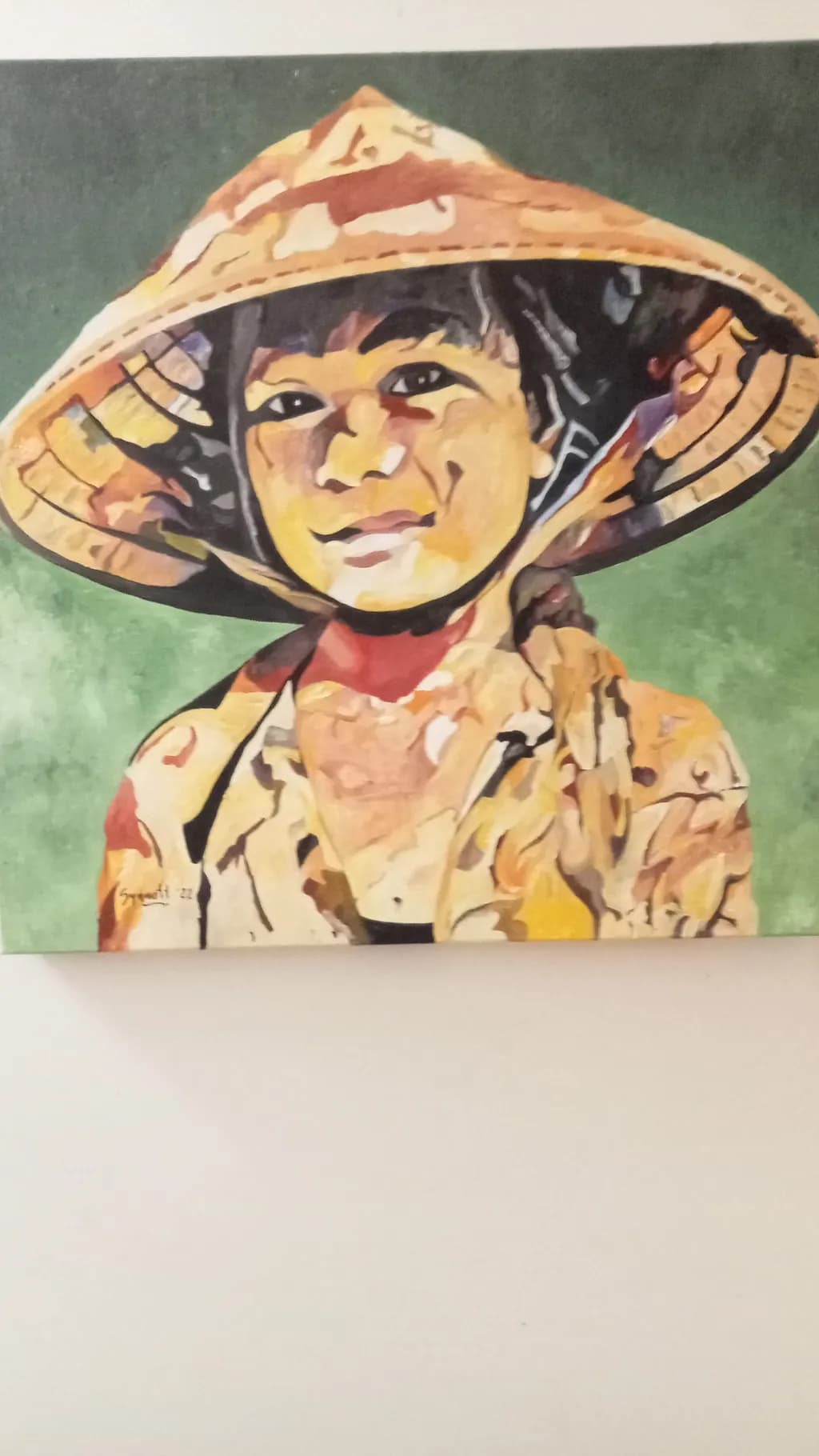 Whimsical Smile: A Colorful Portrait of Childhood Joy in a Traditional Hat