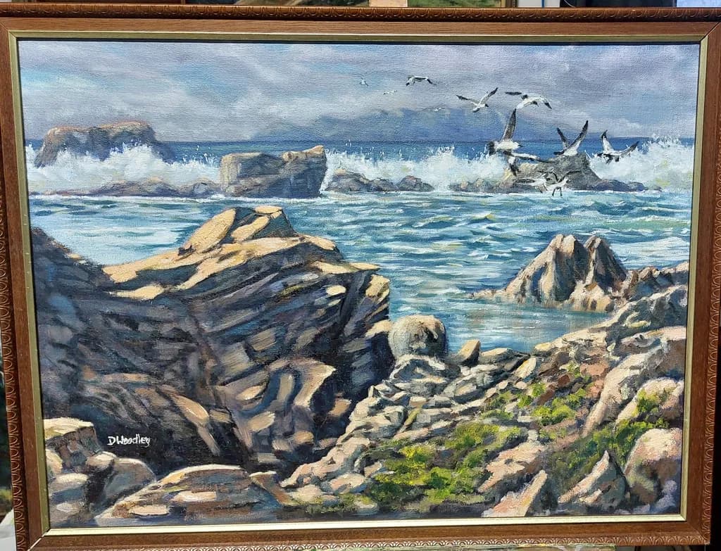 Serenity by the Shore: A Coastal Landscape of Rocks and Waves