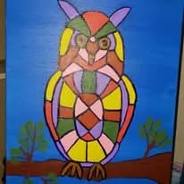 Colorful Mosaic Owl: A Vibrant Expression of Nature's Wisdom