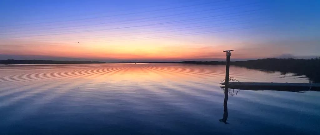 Serenity at Dusk: A Tranquil Reflection on Still Waters