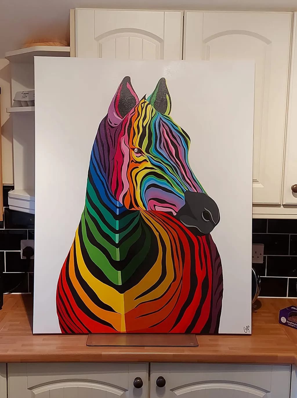 Vibrant Harmony: A Colorful Zebra Portrait Celebrating Nature's Palette