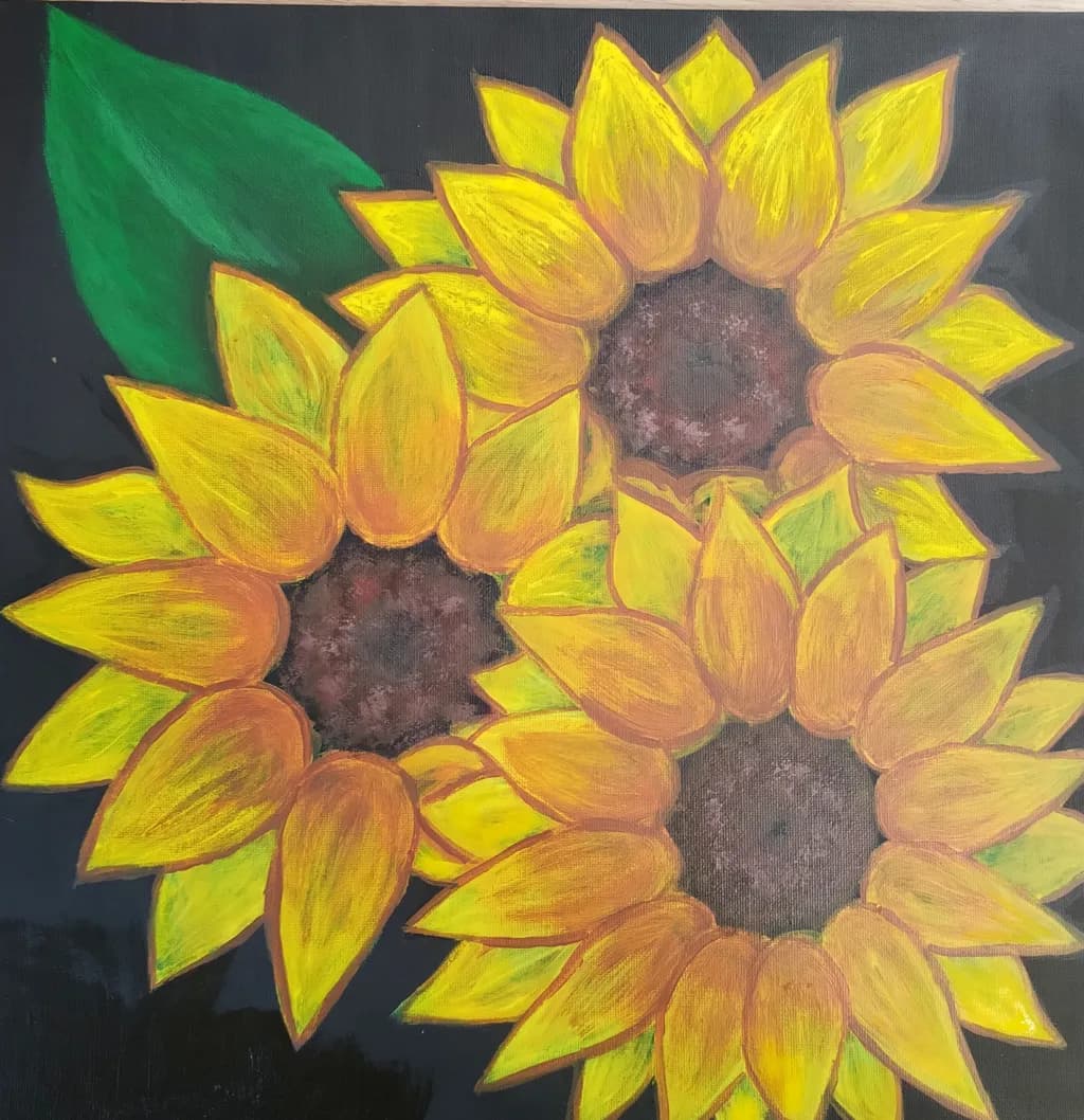 Sunlit Symphony: A Vibrant Trio of Sunflowers Against a Dark Canvas