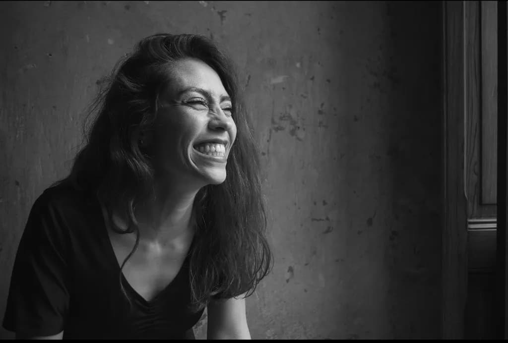 Joyful Laughter: A Black and White Portrait of Happiness and Expression