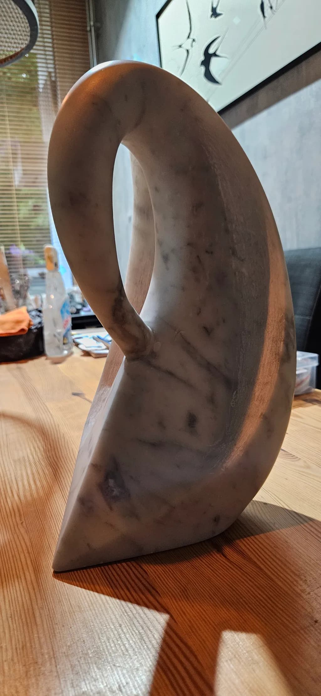 Elegant Curves: A Contemporary Marble Sculpture Embracing Form and Function