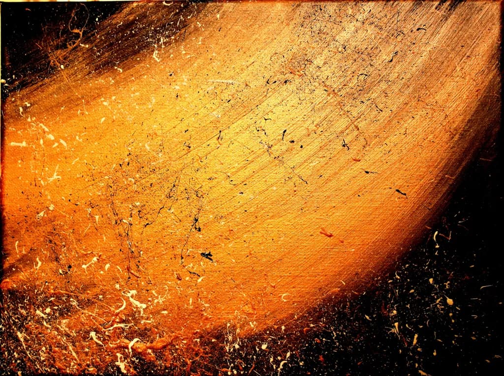 Radiant Chaos: An Abstract Dance of Orange Textures and Contrasts
