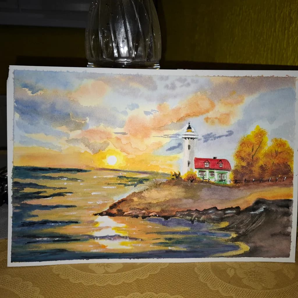 Whispers of Dawn: A Serene Lighthouse Sunrise Over Tranquil Waters