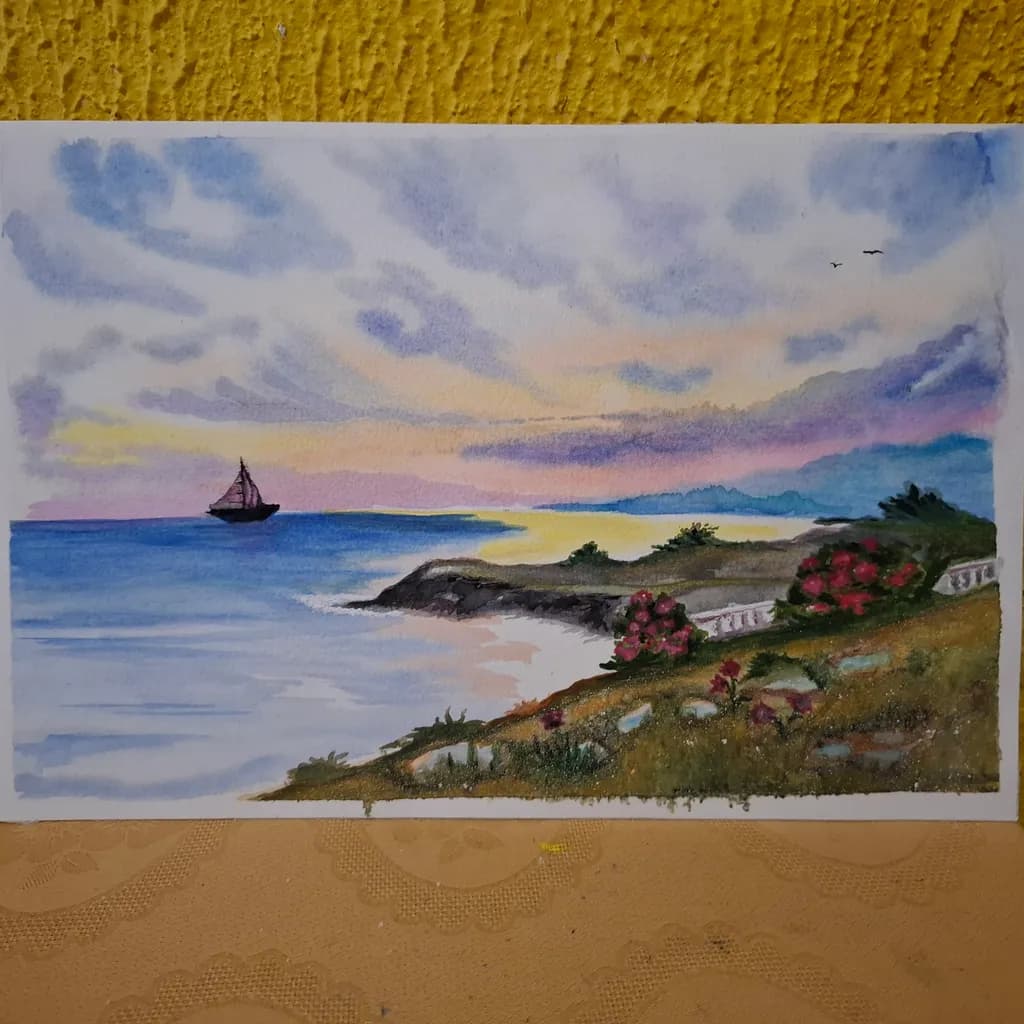 Serenity at Dusk: A Tranquil Seascape with Blossoming Shores and a Sailing Ship