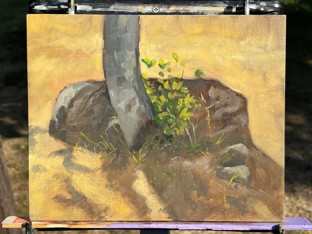 Emerging Life: A Resilient Green Amidst Earthy Tones