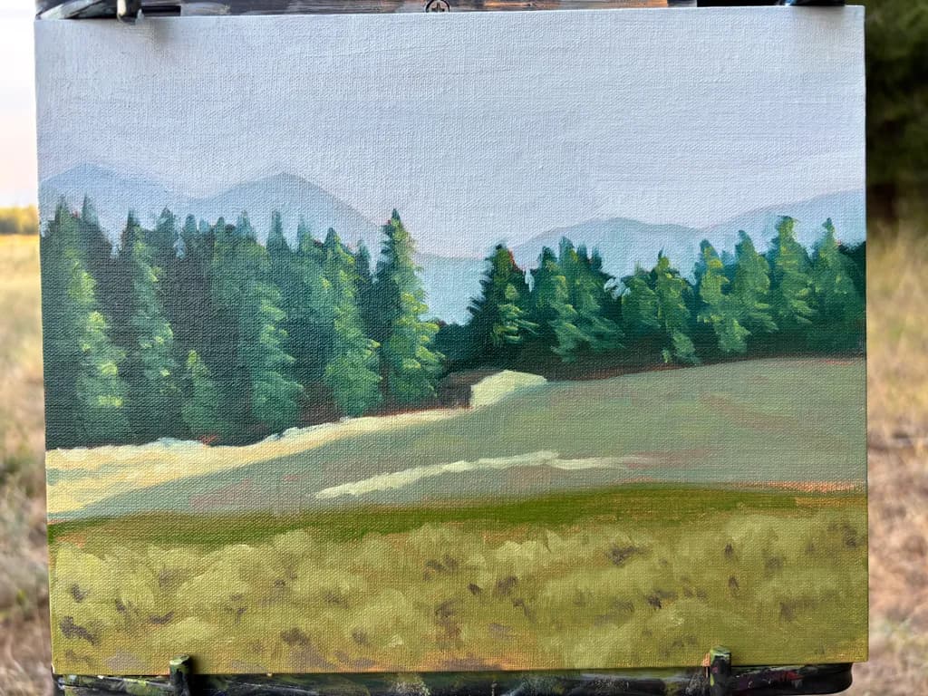 Whispers of Nature: A Serene Landscape of Trees and Mountains