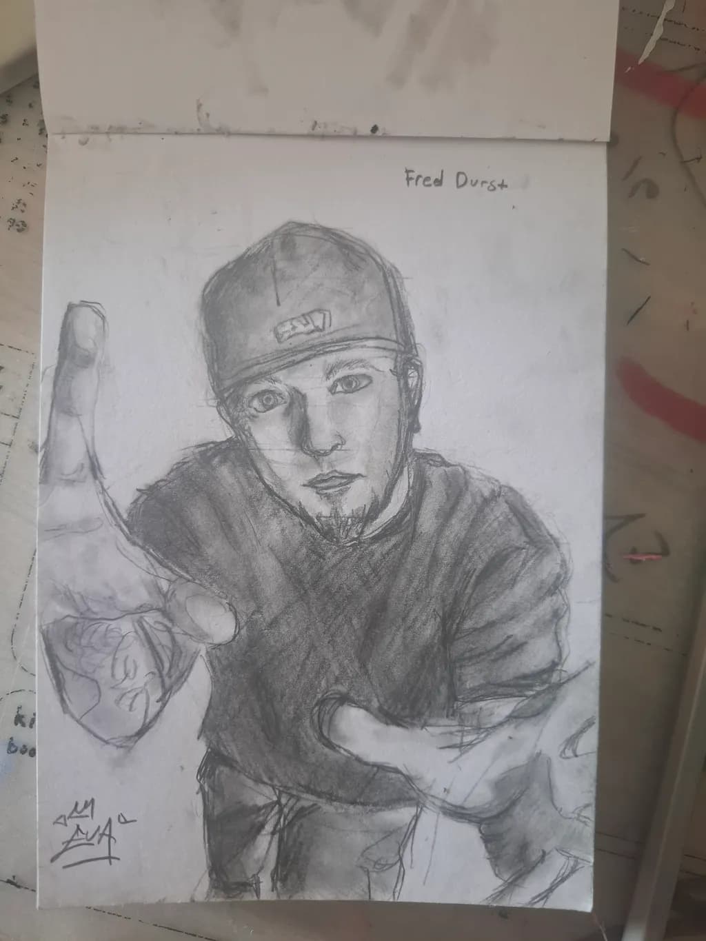 Reaching Out: A Charcoal Portrait of Fred Durst