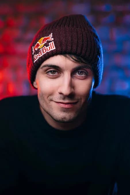 Urban Vibes: A Portrait of Confidence and Style in a Red Bull Beanie