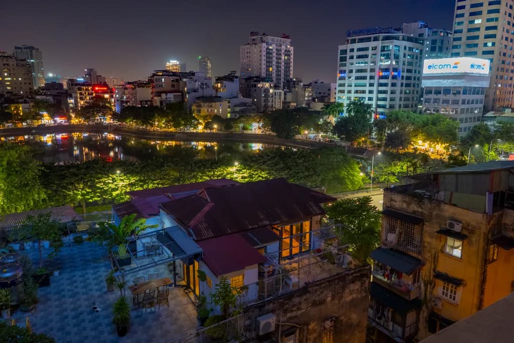 Urban Reflections: A Nighttime Cityscape of Lights and Life