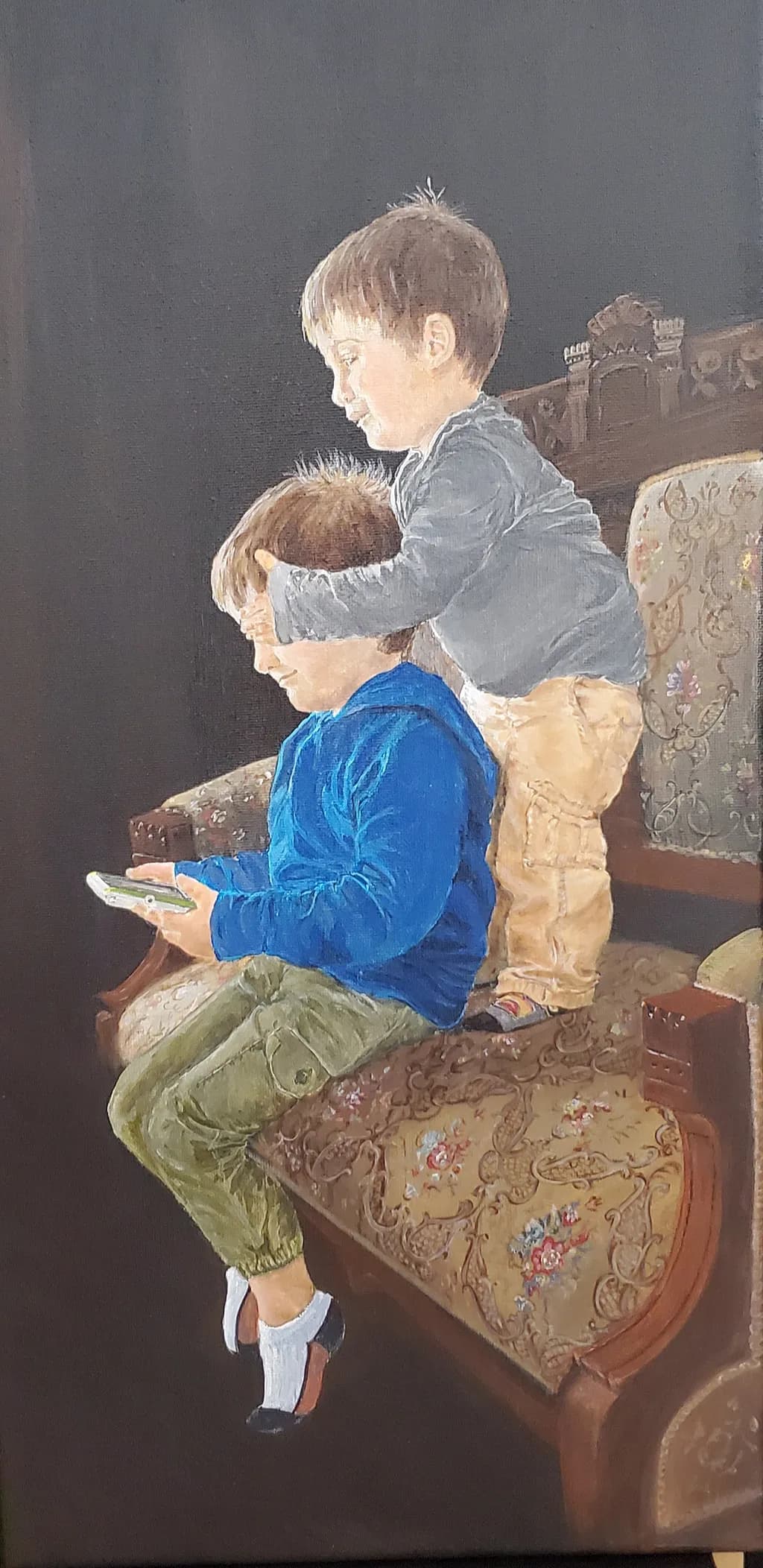 Sibling Moments: A Playful Connection on the Couch