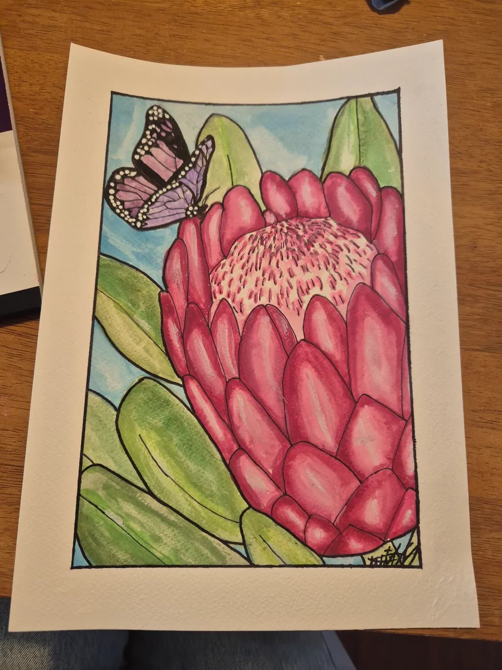 Whispers of Nature: A Vibrant Butterfly and Protea Blossom Dance