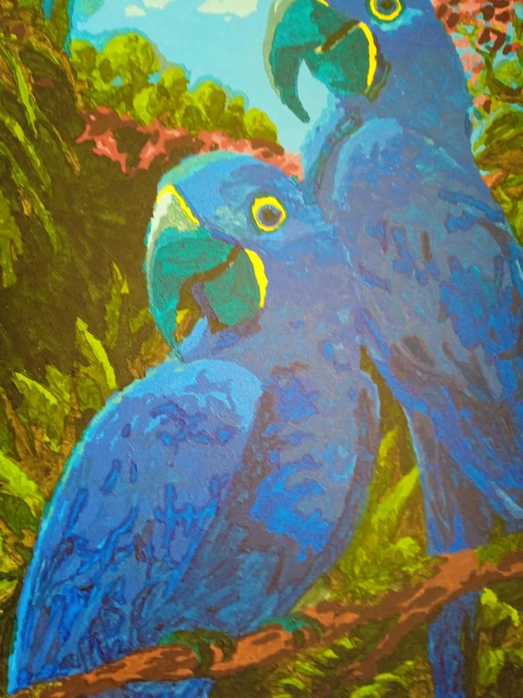 Vibrant Harmony: A Pair of Blue Macaws Amidst Lush Greenery