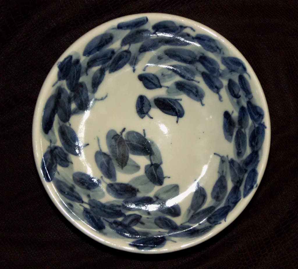Whispers of Nature: Hand-Painted Leaf Motif Ceramic Bowl