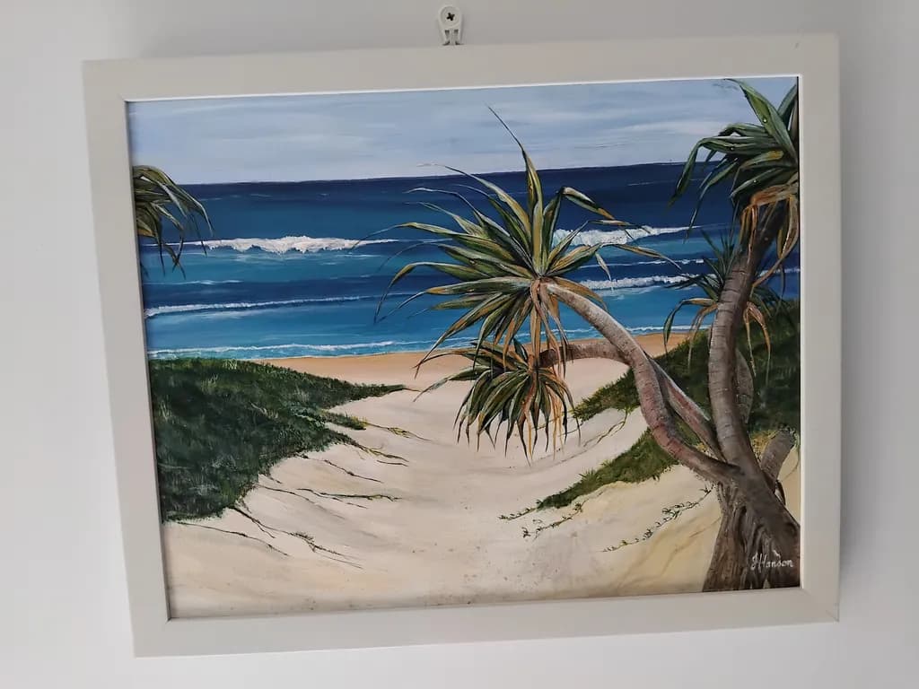 Serene Coastal Escape: A Tranquil Beach Pathway Under the Palm Trees