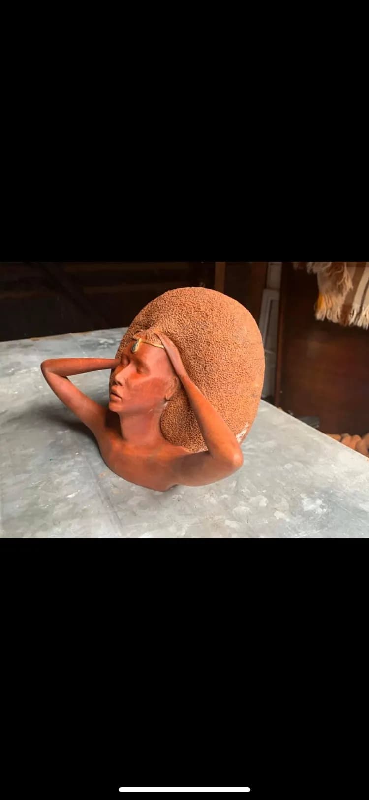 Ethereal Embrace: A Clay Portrait of Creative Expression