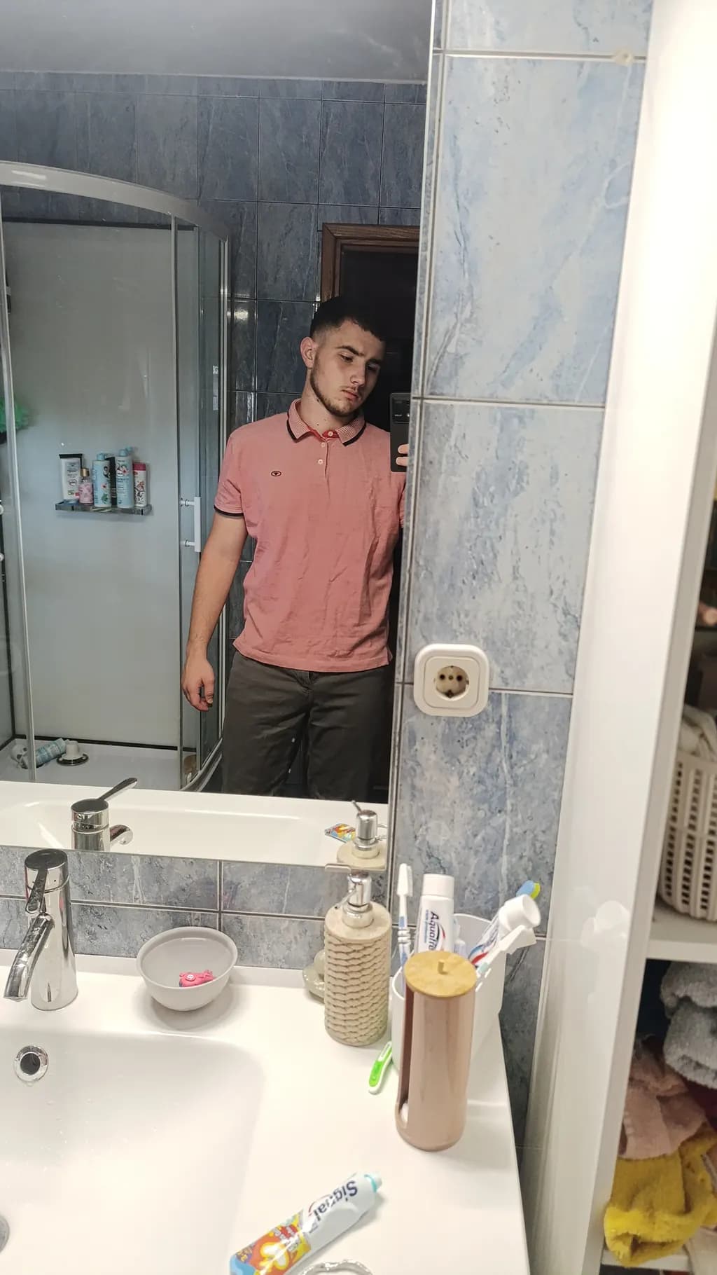 Reflections of Everyday Life: A Self-Portrait in the Bathroom Mirror