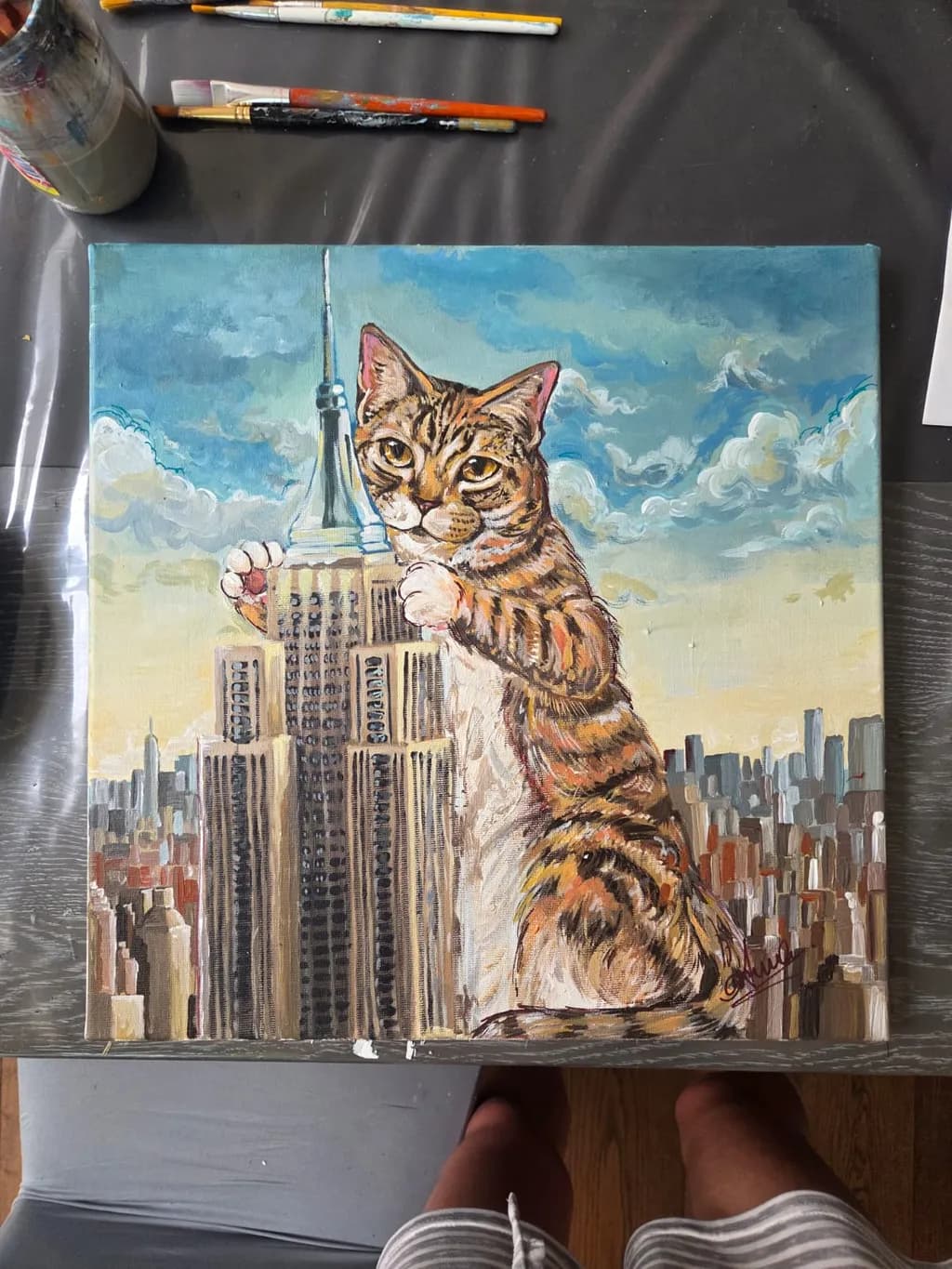 Whiskers on the Skyline: A Playful Cat's Takeover of the Empire State Building