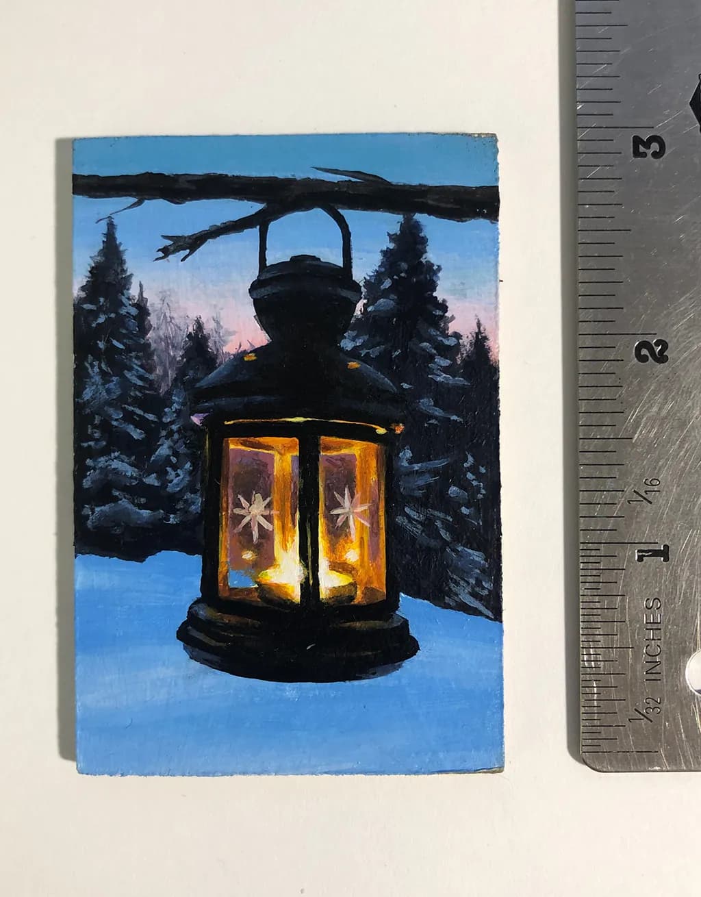 Winter's Glow: A Lantern Illuminating the Snowy Forest at Dusk
