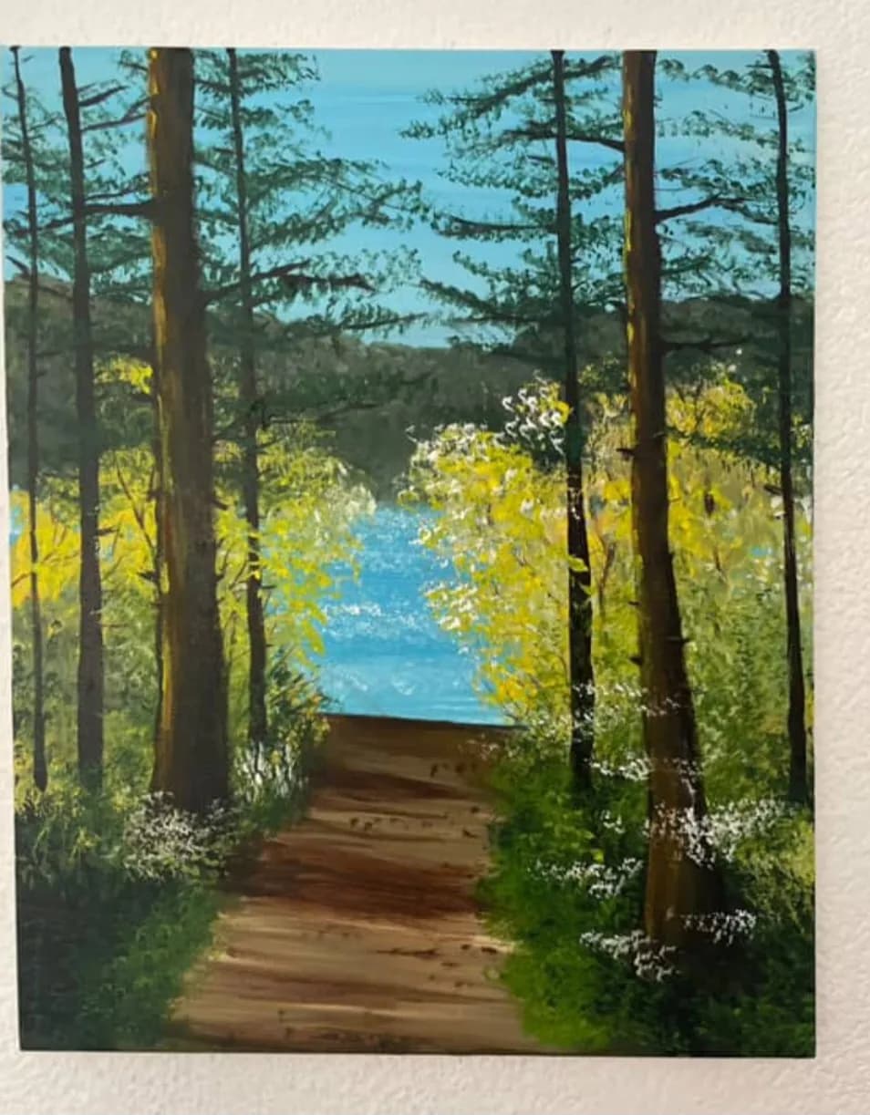 Whispers of Nature: A Serene Pathway Through Lush Pines and Tranquil Waters