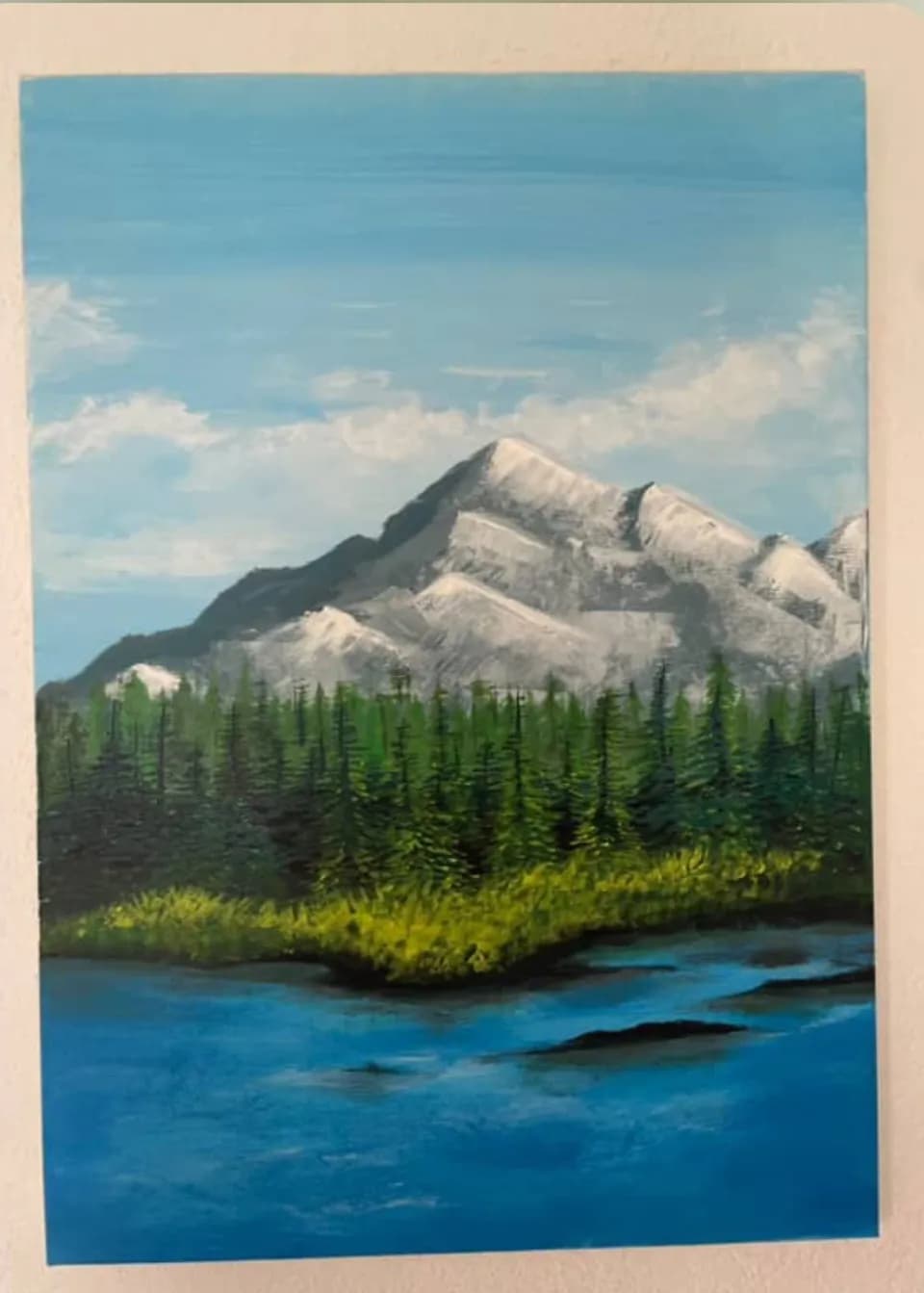 Serenity in Nature: Majestic Mountains and Tranquil Waterscape