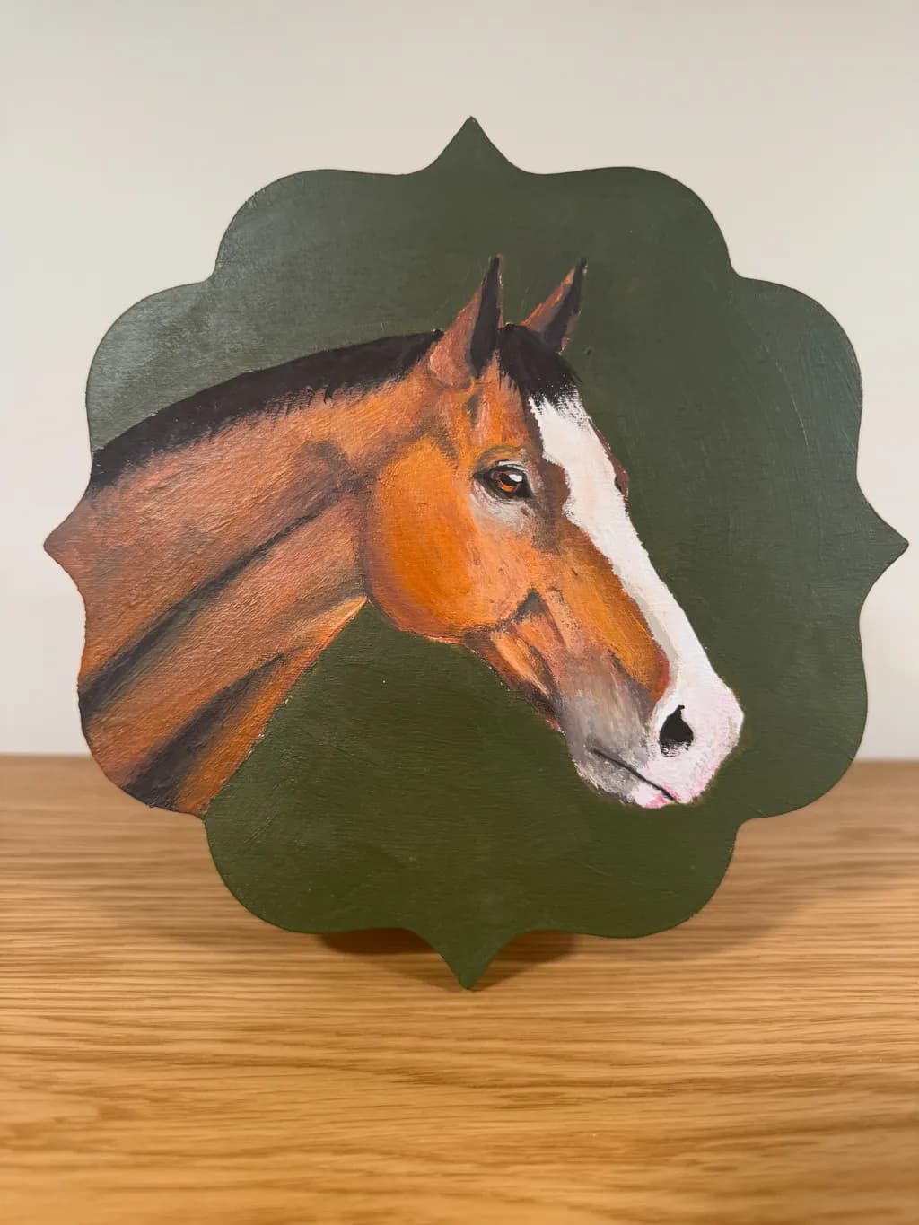 Majestic Equine Portrait: A Captivating Horse Head on a Rich Green Background