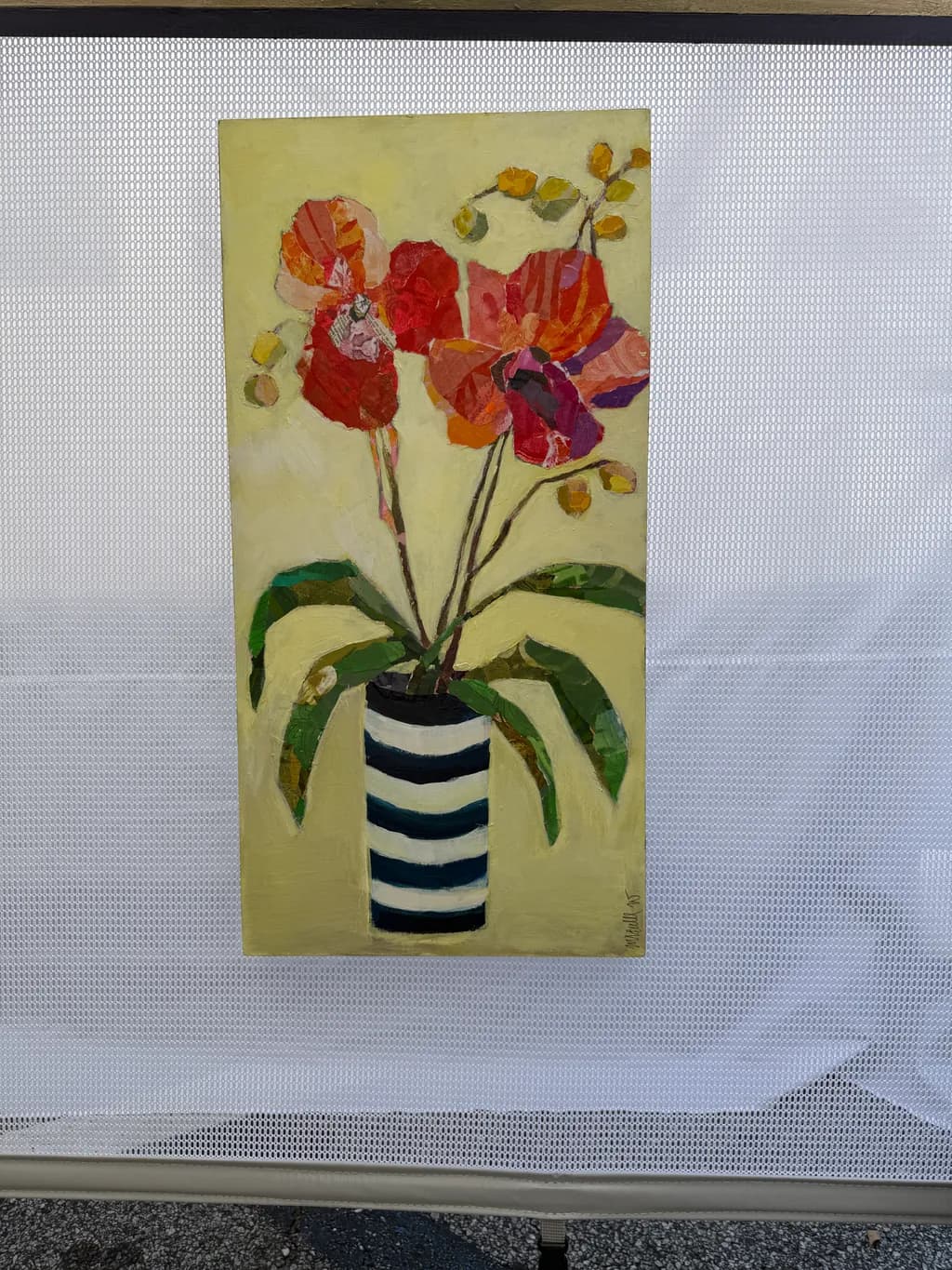 Vibrant Blooms: A Playful Dance of Color in a Striped Vase
