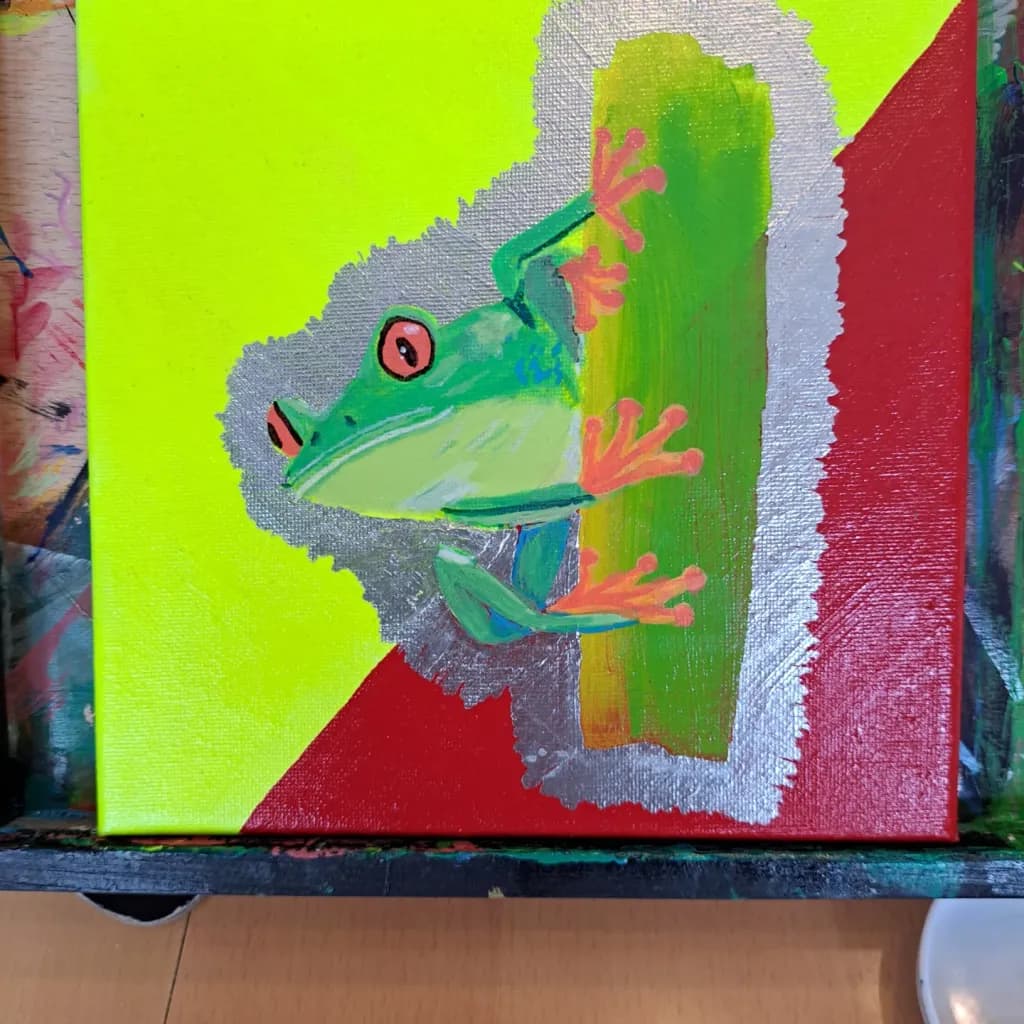 Vibrant Leap: A Colorful Frog's Canvas Adventure